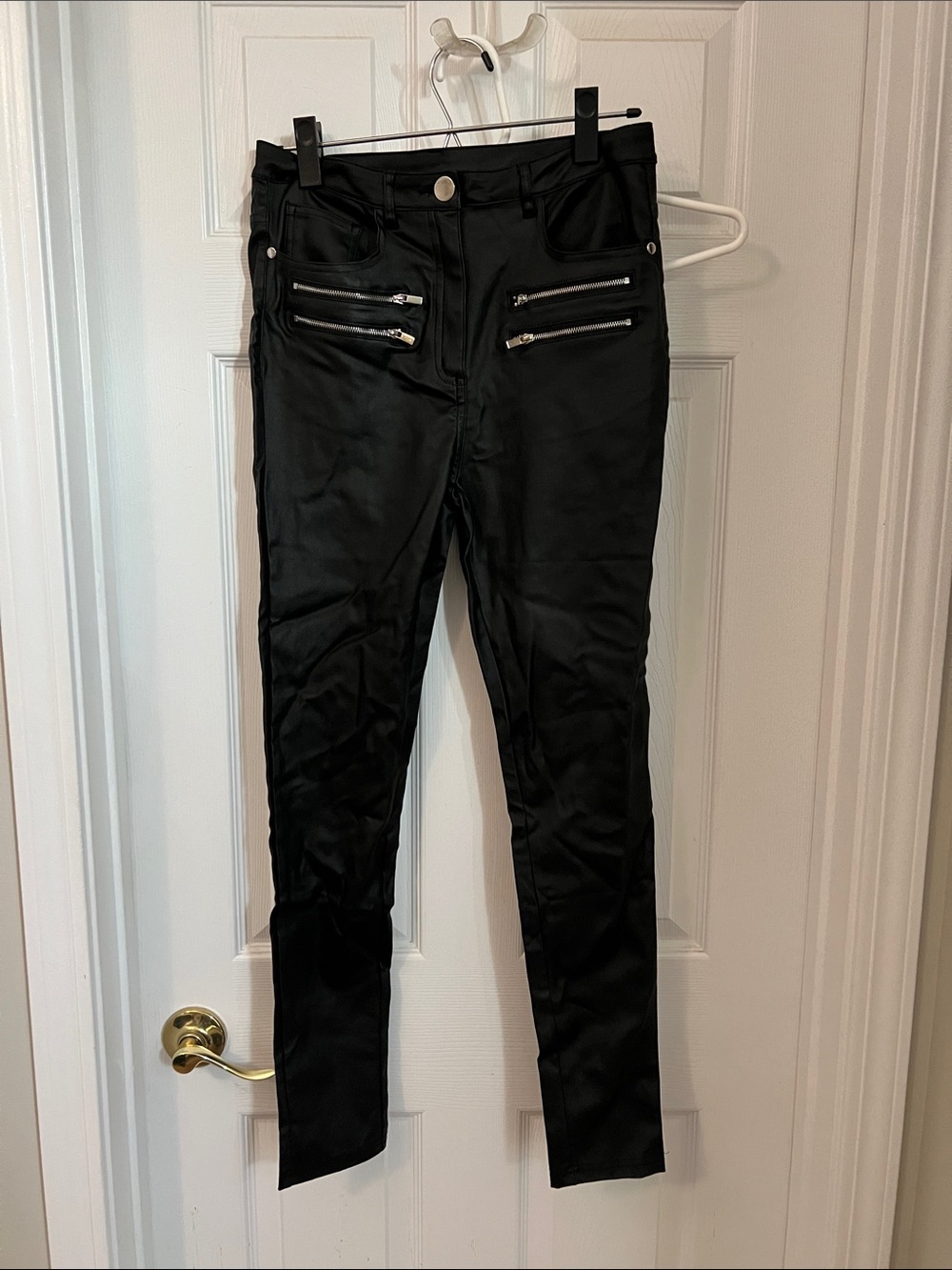 Women’s Black Skinny Jeans with Silver Zipper Accents